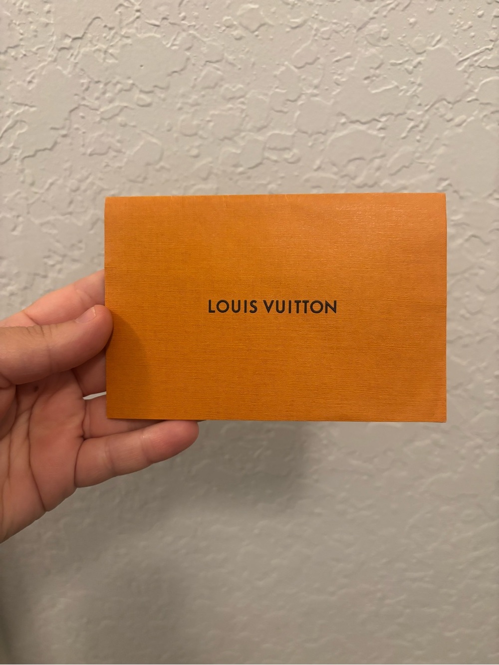 Louis Vuitton receipt holder
